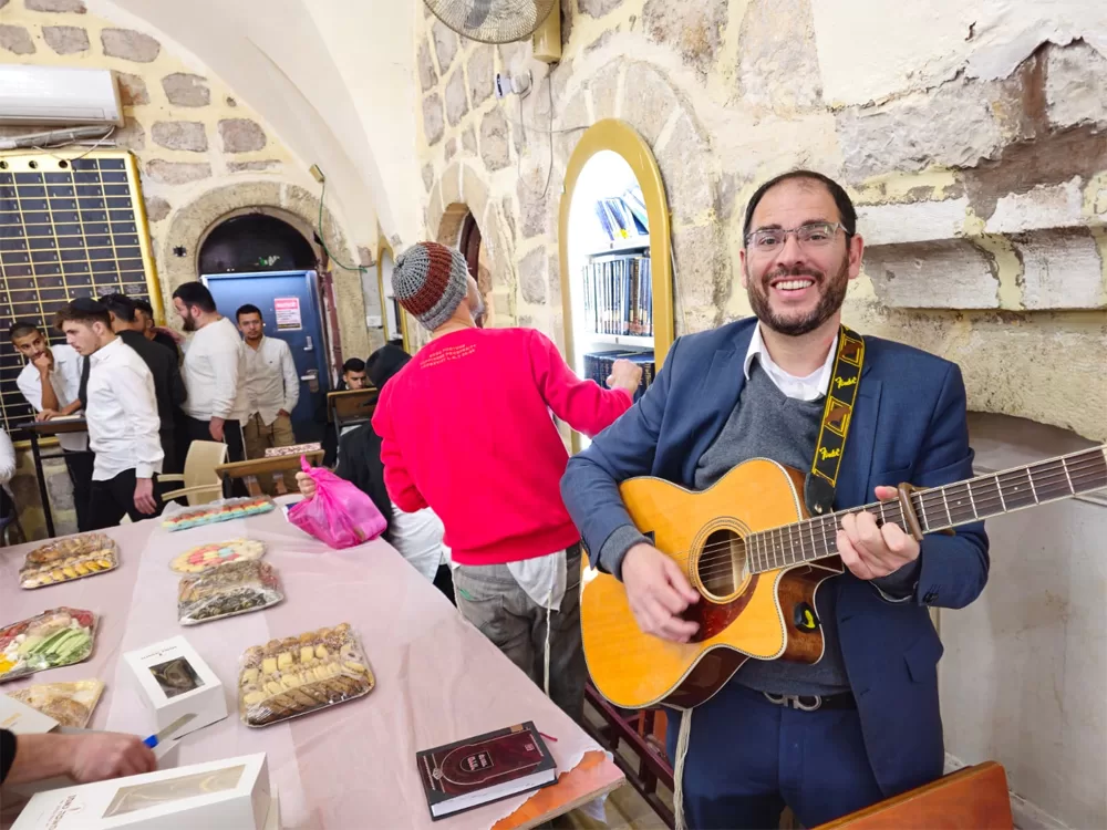 Rabbi Reuven Reich Plays Guitar